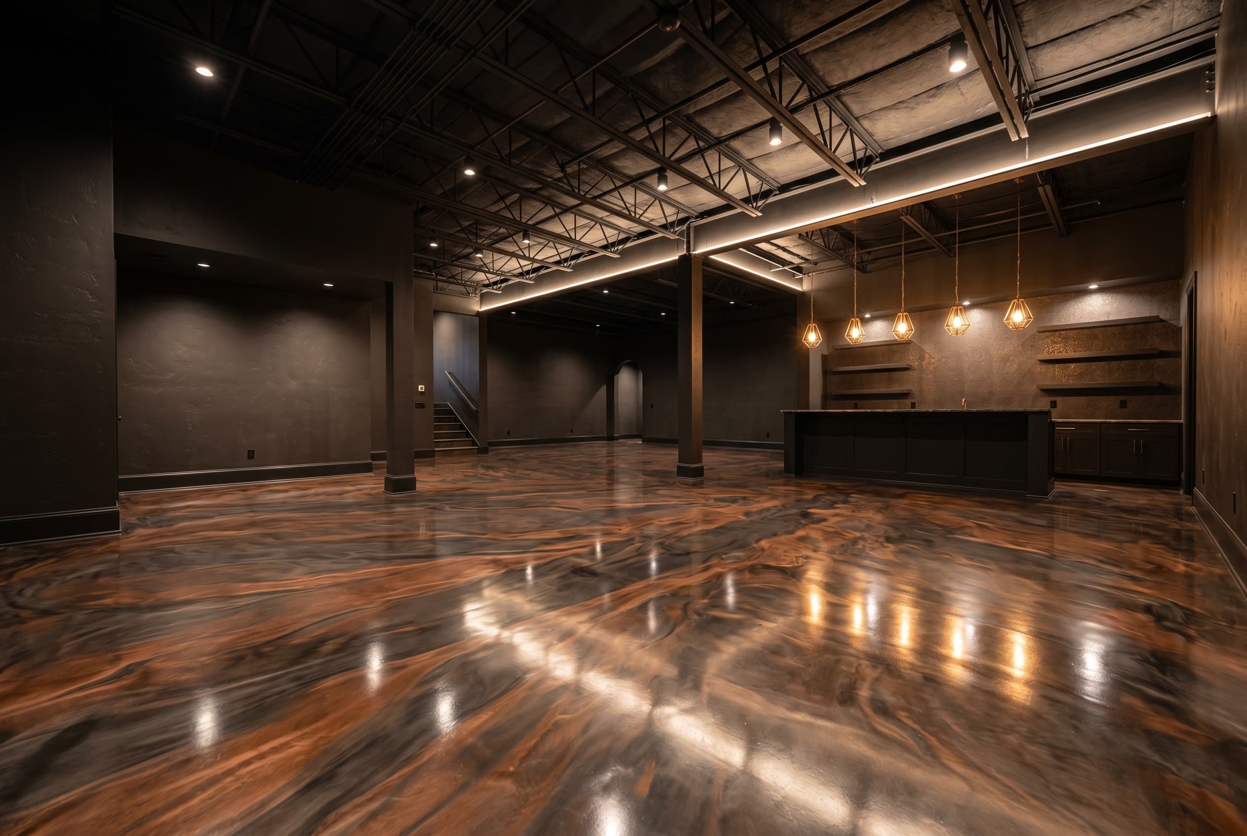 Wide showroom space with metallic epoxy in copper and charcoal.